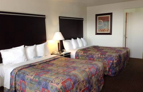 Days-Inn-Oceanside-beachfront-economy-hotel-bedrooms
