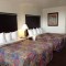 Days-Inn-Oceanside-beachfront-economy-hotel-bedrooms